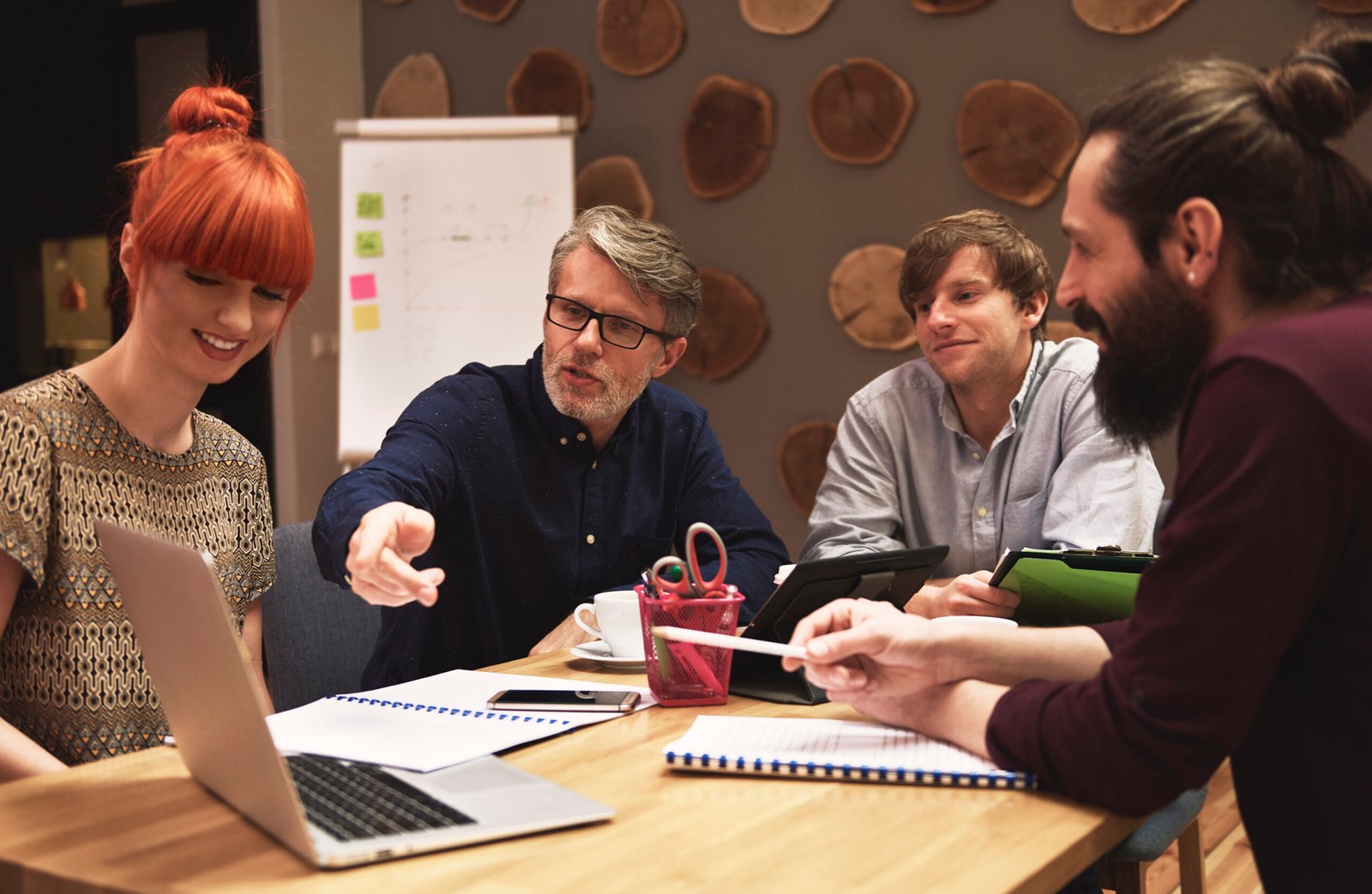 Manager showing idea for finding new customers Manager showing idea for finding new customers